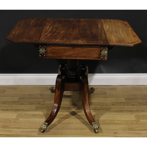 2354 - A Regency gilt metal mounted mahogany Pembroke table, rosewood banded canted rectangular top with fa... 