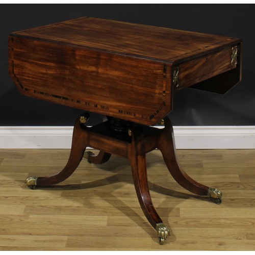 2354 - A Regency gilt metal mounted mahogany Pembroke table, rosewood banded canted rectangular top with fa... 