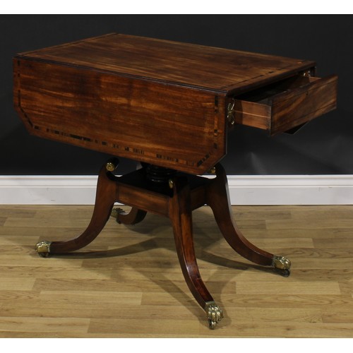 2354 - A Regency gilt metal mounted mahogany Pembroke table, rosewood banded canted rectangular top with fa... 