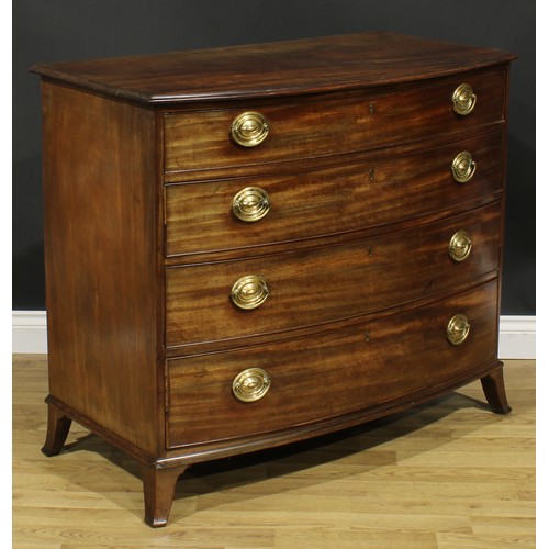 2356 - A Regency mahogany bowfront chest, oversailing top above four long graduated cockbeaded drawers, the... 