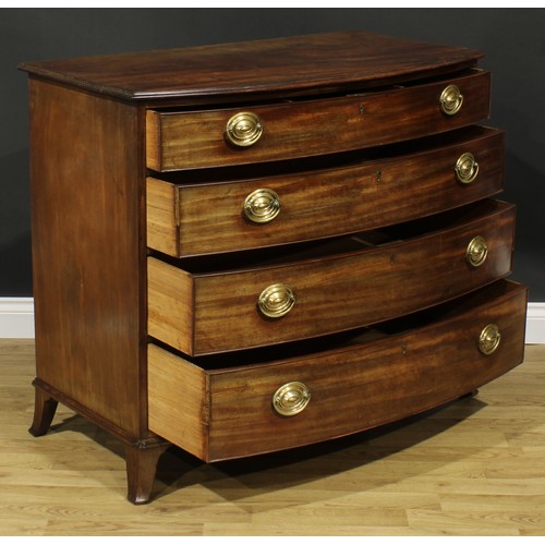 2356 - A Regency mahogany bowfront chest, oversailing top above four long graduated cockbeaded drawers, the... 