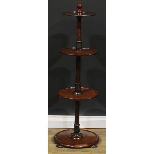 1626 - A 19th century mahogany circular four-tier dumbwaiter, dished plateaux, bun feet, 122cm high, the la... 