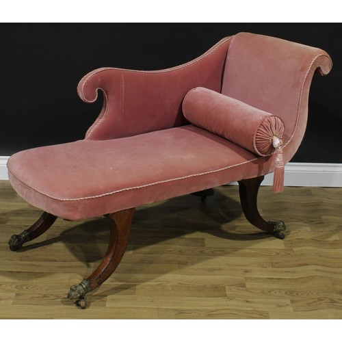 2358 - A Regency mahogany chaise longue, of unusually small proportions, stuffed-over upholstery, sabre leg... 