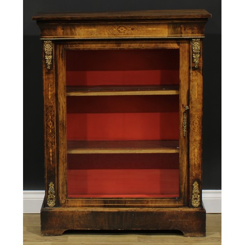 2261 - A Victorian gilt metal mounted walnut and marquetry pier display cabinet, oversailing top above a co... 