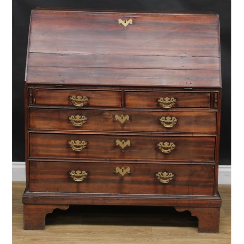 2062 - An unusual George II/early III laburnum bureau, fall front enclosing a cupboard flanked by secret co... 