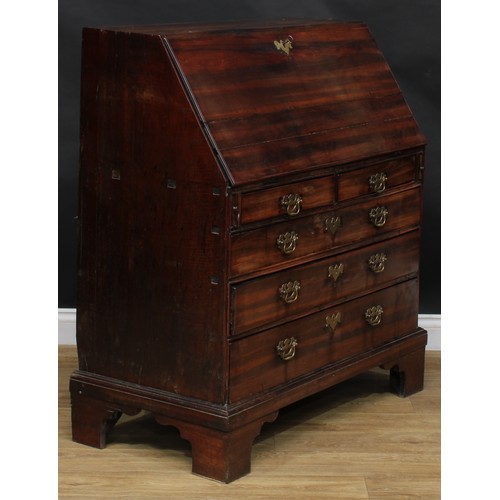 2062 - An unusual George II/early III laburnum bureau, fall front enclosing a cupboard flanked by secret co... 