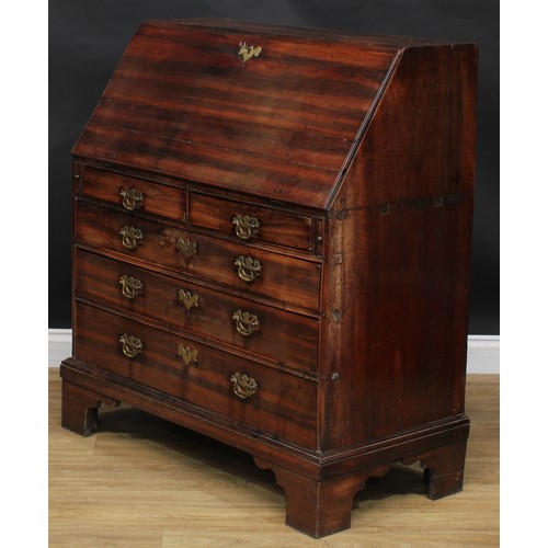 2062 - An unusual George II/early III laburnum bureau, fall front enclosing a cupboard flanked by secret co... 