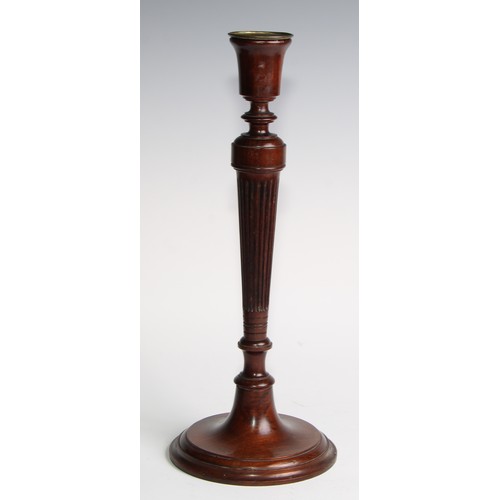 1822 - A pair of Adam Revival mahogany table candlesticks, bell shaped sconces with brass nozzles, tapered ... 