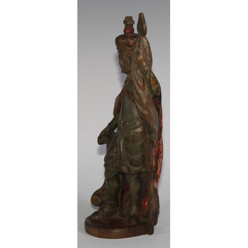 1676 - A Baroque carved and polychrome painted softwood figure, of a king, 29cm high, 18th/19th century