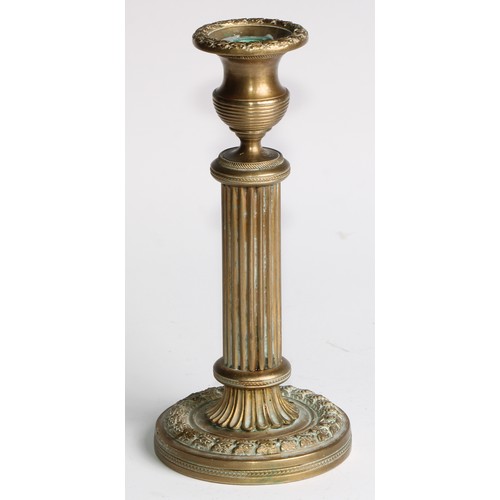 1817 - A pair of 19th century gilt bronze candlesticks, campana sconces, fluted pillars, acanthus borders, ... 