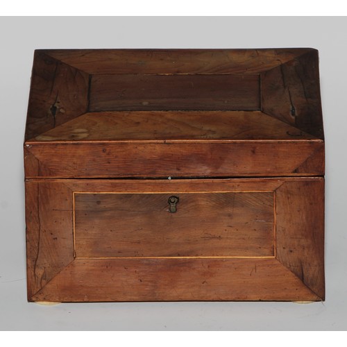 1672 - A 19th century Irish yew and arbutus wood stationery box, hinged sloping cover enclosing a fitted in... 