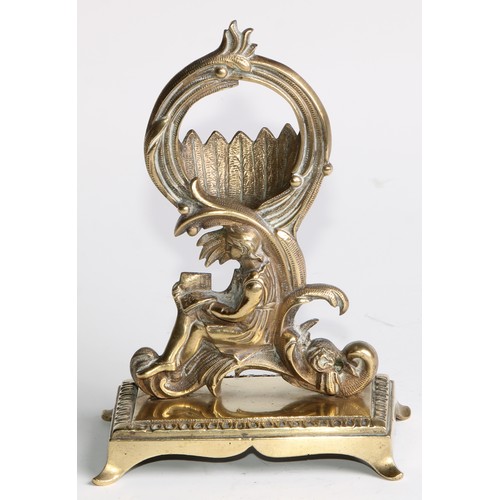 1555 - A 19th century brass pocket watch stand, cast in the Rococo taste with a figure reading, 17cm high, ... 