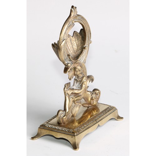 1555 - A 19th century brass pocket watch stand, cast in the Rococo taste with a figure reading, 17cm high, ... 