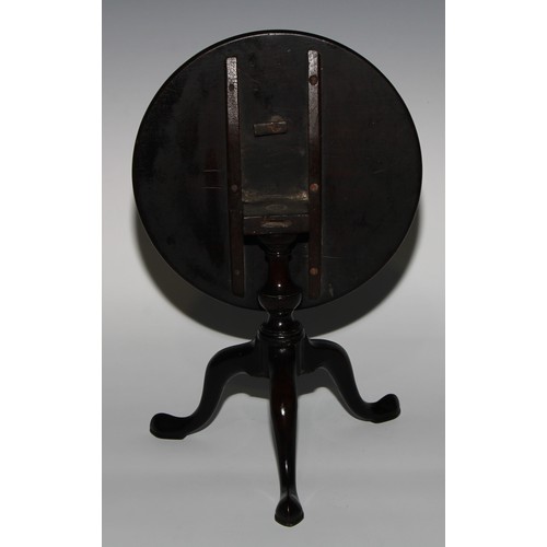 2460 - A George III mahogany miniature tripod occasional table, circular tilting top, turned baluster pilla... 