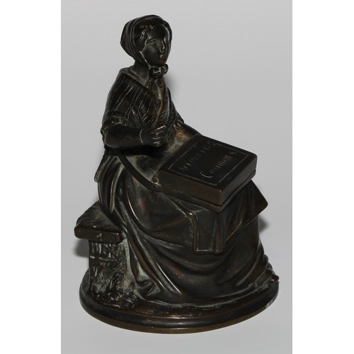 1559 - A 19th century dark patinated bronze novelty so-to-bed or table vesta, as a match girl, the box on h... 