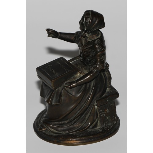 1559 - A 19th century dark patinated bronze novelty so-to-bed or table vesta, as a match girl, the box on h... 