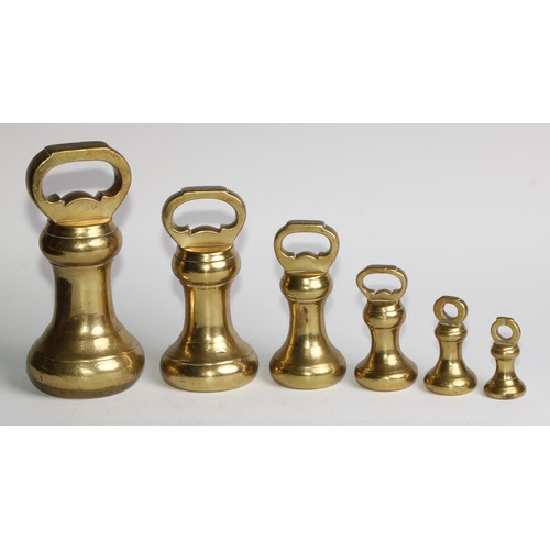 2553 - A set of six brass bell weights, by Bartlett, Bristol, 7lb to 4oz, the largest 18.5cm high