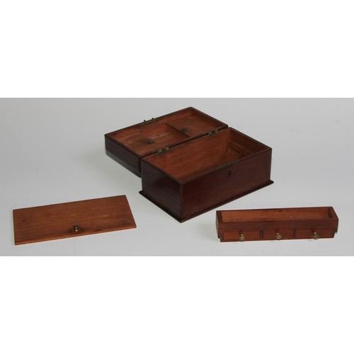 1923 - An early 20th century mahogany miniature sea or carpenter’s chest, hinged cover enclosing a fall-fro... 