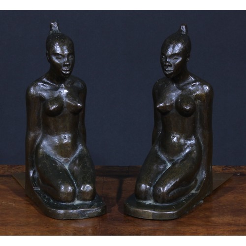 1823 - A pair of Art Deco brown patinated bronze bookends, probably Austrian, each cast as a kneeling exoti... 