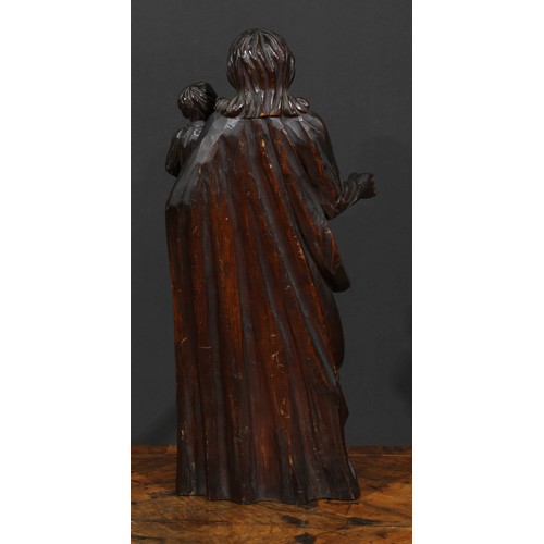 2631 - An 18th century Continental softwood figure, carved as Christ holding an infant, 50cm high, c.1700-1... 