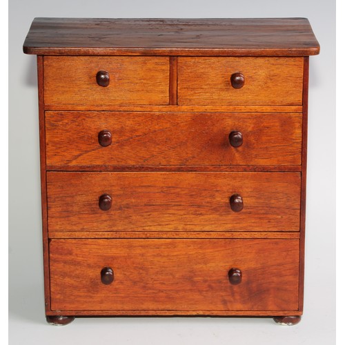 2723 - Miniature Furniture - a chest of two short and three long graduated drawers, oversailing top, turned... 