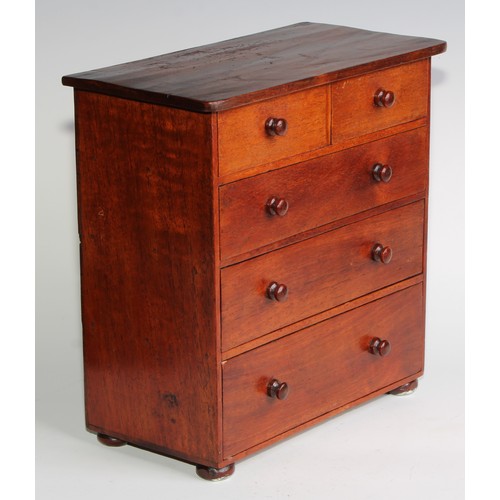 2723 - Miniature Furniture - a chest of two short and three long graduated drawers, oversailing top, turned... 