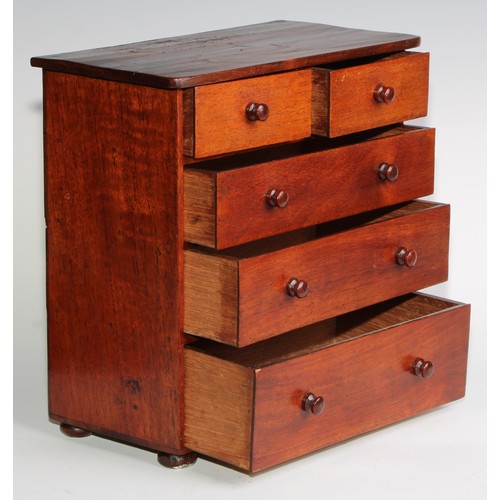 2723 - Miniature Furniture - a chest of two short and three long graduated drawers, oversailing top, turned... 