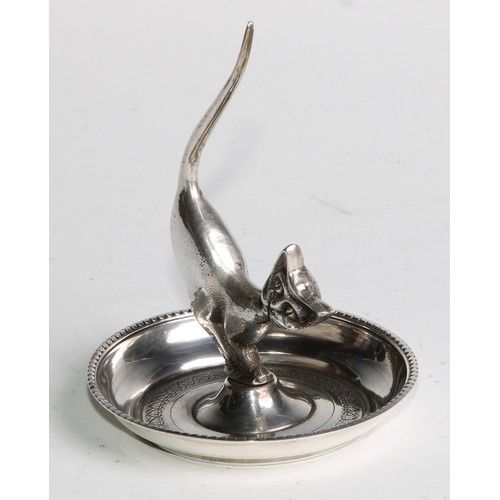 879 - A Continental silver novelty ring tree, as a stylised cat, the dished base bright-cut engraved, 9cm ... 