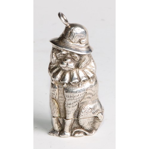 1067 - A silver novelty vesta case, cast as Mr Punch’s Dog Toby, 5.5cm long, marked Sterling