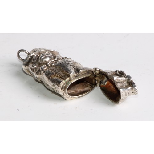 1067 - A silver novelty vesta case, cast as Mr Punch’s Dog Toby, 5.5cm long, marked Sterling