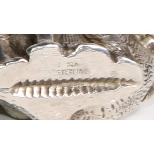 1067 - A silver novelty vesta case, cast as Mr Punch’s Dog Toby, 5.5cm long, marked Sterling