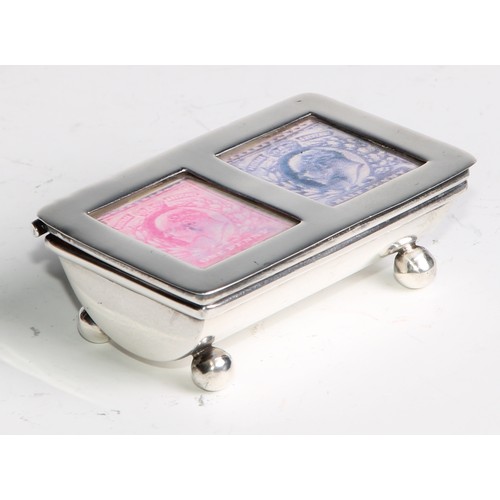 1187 - An Elizabeth II silver stamp box, hinged cover with glazed aperture, enclosing twin-compartments, ba... 