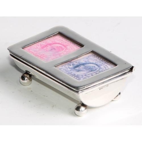 1187 - An Elizabeth II silver stamp box, hinged cover with glazed aperture, enclosing twin-compartments, ba... 