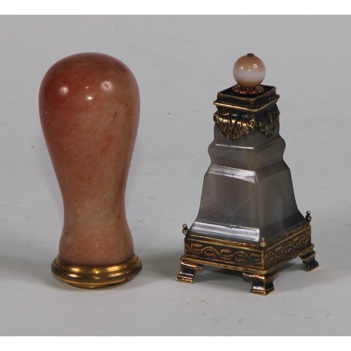 2143 - A 19th century polished alabaster desk seal, blood agate matrix, 7cm long; a silver-gilt coloured me... 