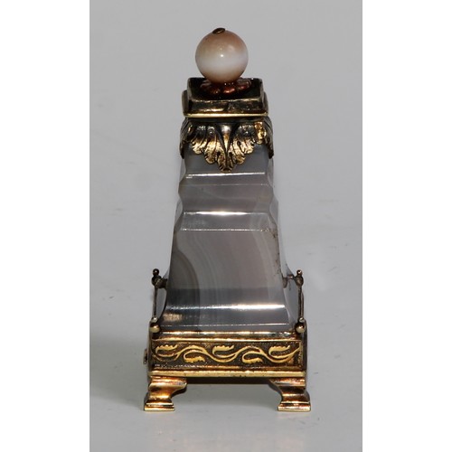 2143 - A 19th century polished alabaster desk seal, blood agate matrix, 7cm long; a silver-gilt coloured me... 