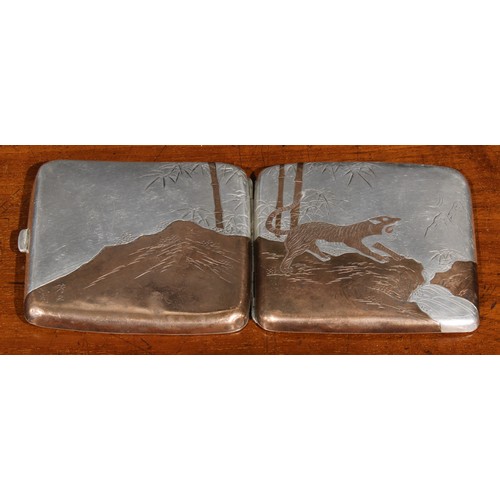 987 - A Japanese silver rounded rectangular cigarette case, decorated in bi-metal with tigers in a rocky l... 