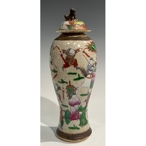 354 - A Chinese baluster vase, painted in tones of underglaze blue with birds, flowers and foliage, moulde... 