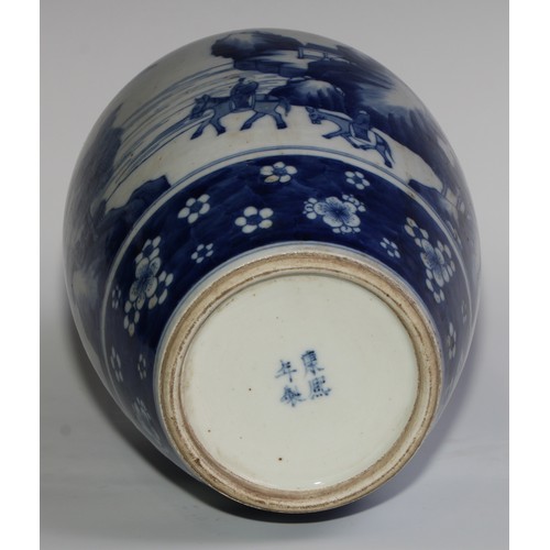 400 - A Chinese ovoid vase, painted in tones of underglaze blue with figures riding donkeys in a monumenta... 