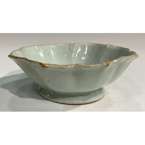 356 - A Chinese celadon lotus shaped dish, brown line to rim, 18cm diam, 19th century