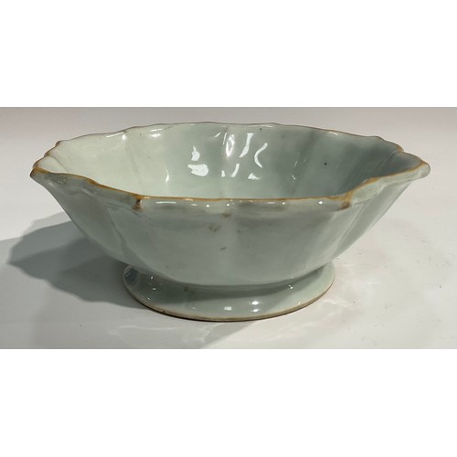 356 - A Chinese celadon lotus shaped dish, brown line to rim, 18cm diam, 19th century