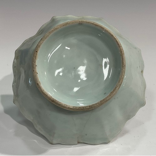 356 - A Chinese celadon lotus shaped dish, brown line to rim, 18cm diam, 19th century