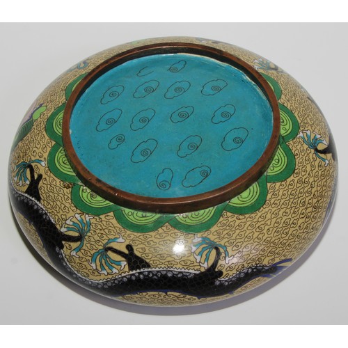 375 - A Chinese cloisonne enamel circular bowl, decorated in polychrome with a ferocious dragon, 17cm diam... 