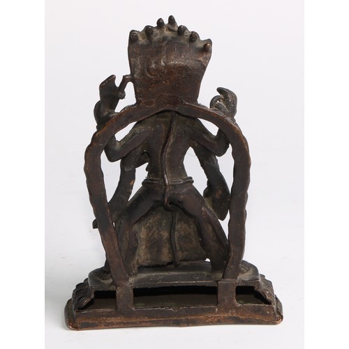 464 - Indian School (19th century), a dark patinated bronze shrine figure, of Ganesh, rounded rectangular ... 