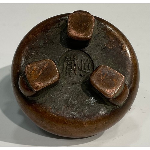 377 - A Chinese copper alloy tripod censer, of small proportions, scroll handles, 5.5cm wide, seal mark, 1... 