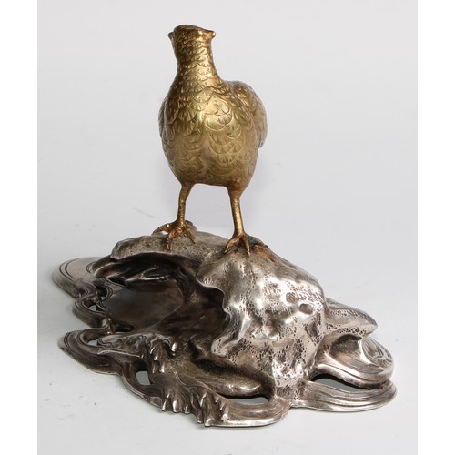 468 - Japanese School (Meiji period), a gilt and silvered bronze, of a pheasant on a prunus root above wav... 