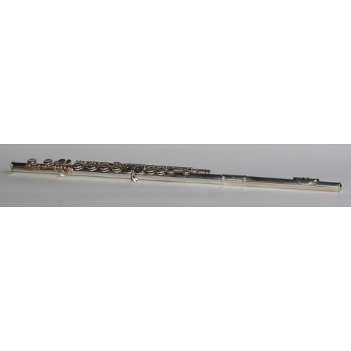 1872 - A Gemeinhardt M2S solid silver flute, in three sections, serial no. 407749, 71cm long overall, cased