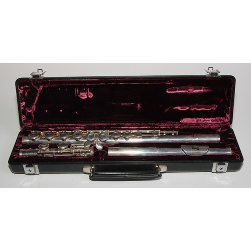 1872 - A Gemeinhardt M2S solid silver flute, in three sections, serial no. 407749, 71cm long overall, cased