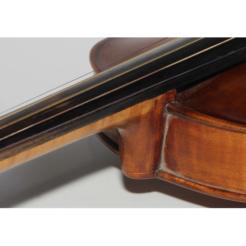 1874 - A Swedish violin, by Ernst Boethius, Norberg, the two-piece back 35.5cm long excluding button, ink M... 