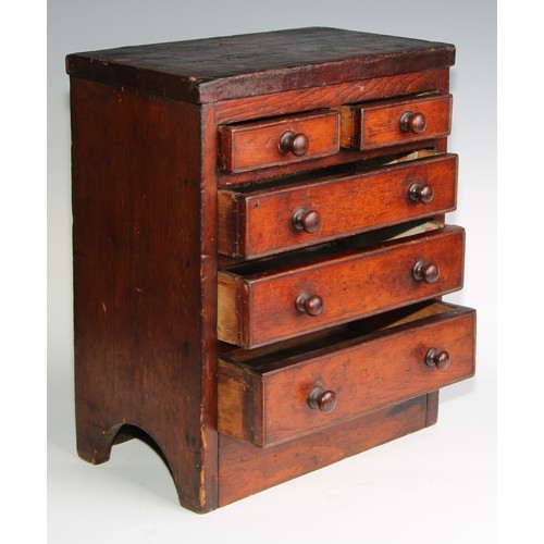 2073 - Miniature Furniture - a scratch built chest of two short and three long graduated drawers, the under... 