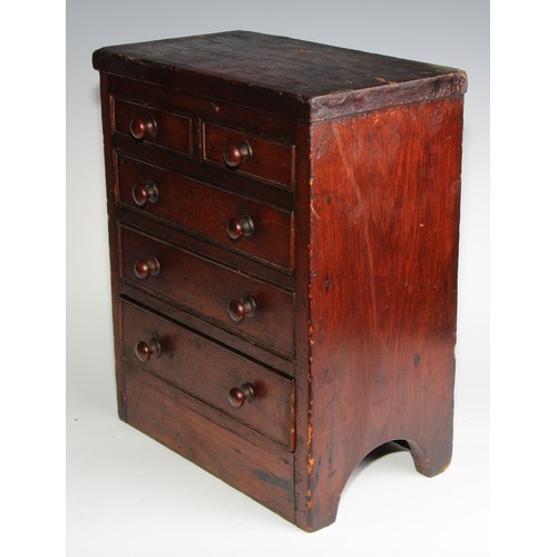 2073 - Miniature Furniture - a scratch built chest of two short and three long graduated drawers, the under... 